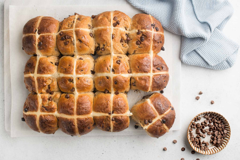Delicious and decadent Hot Cross Buns with chocolate chips! These buns are subtly spiced and generously studded with chocolate, making them the perfect Easter treats