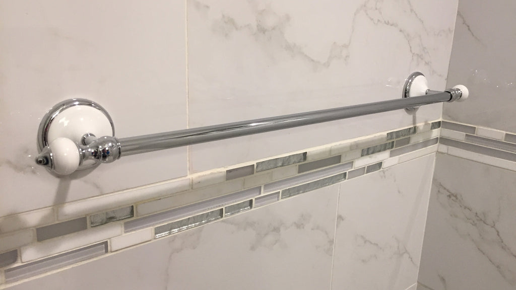Install a towel bar on a porcelain tile wall