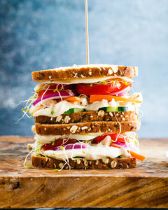 A hummus sandwich is the best healthy easy lunch idea! This plant based recipe takes just a few minutes to make with colorful crunchy veggies.