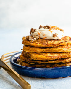 These carrot cake pancakes are moist and spiced, a healthy spin that’s just sweet enough! The maple Greek yogurt topping takes them over the top.