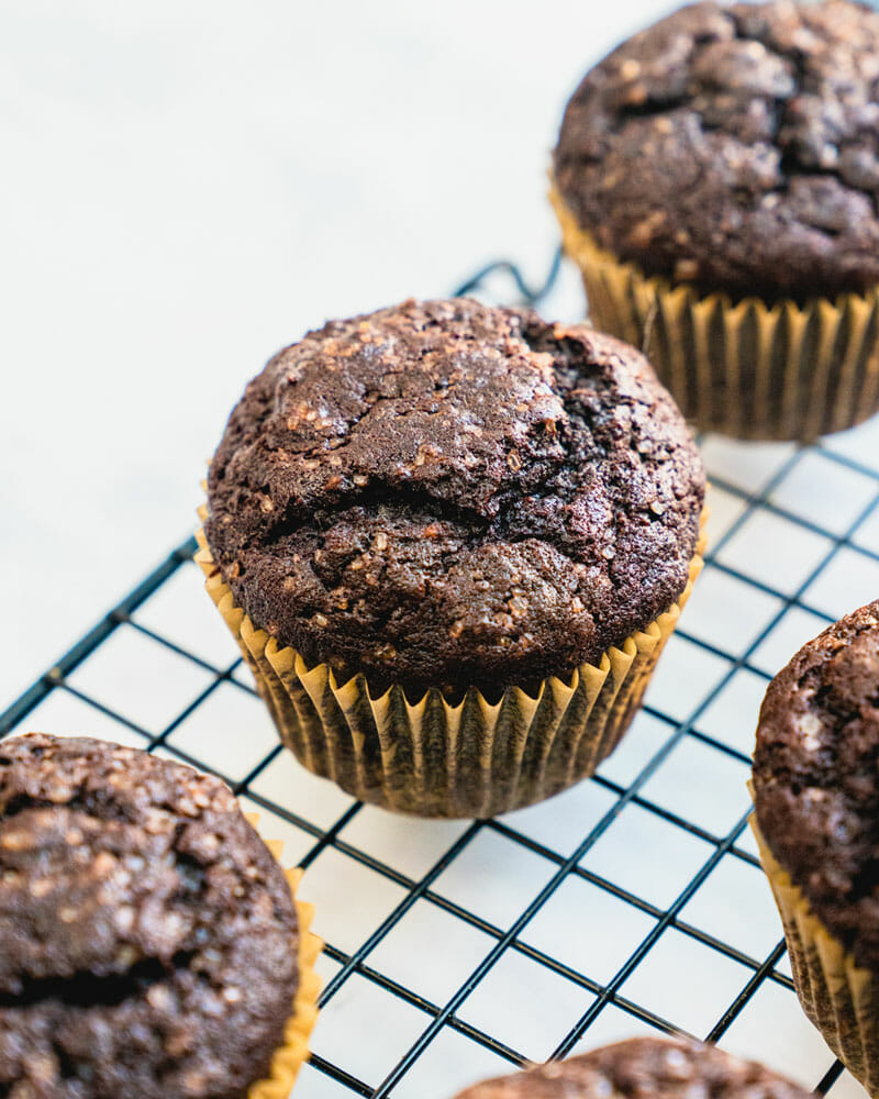 Wow is all we can say about these chocolate banana muffins! They’re dark chocolaty with a light crunch on top and a moist interior.